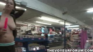 Huge-Titted stunner bares it all at the pornography store