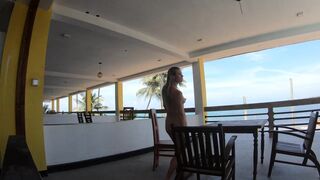  Bare dame walks on the balcony neglecting the ocean - POV tits