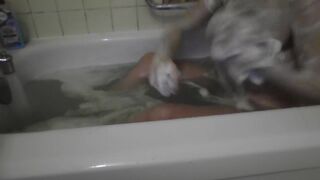  It's just a neighbor washing her tub. Touching foam on her boobs. - POV tits