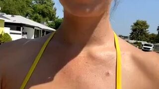  Unexperienced unveils her puffies from her bathing suit in public. - POV tits