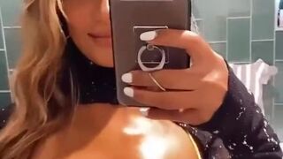  Oily tits in the reflection of mirror - POV tits